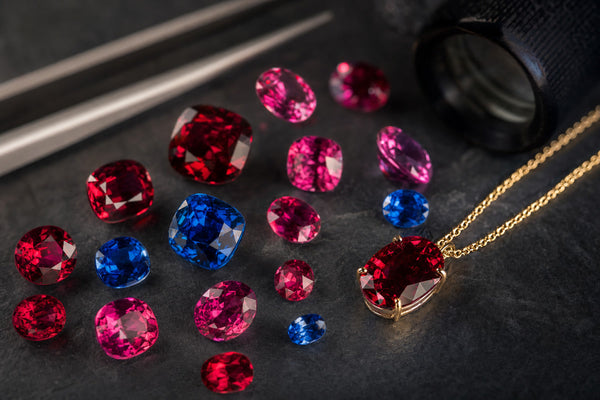 Spinel gemstone jewelry — red pink and blue spinel stones with gold necklace