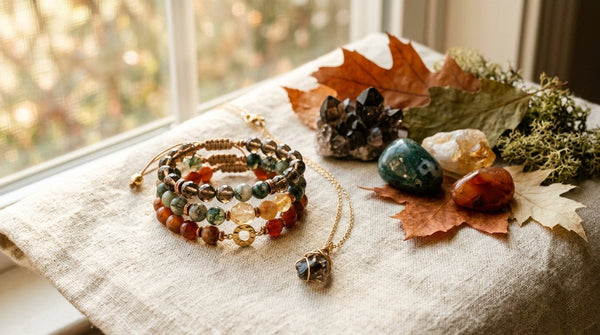 Fall crystal jewelry styling with earthy gemstone bracelets and a crystal pendant